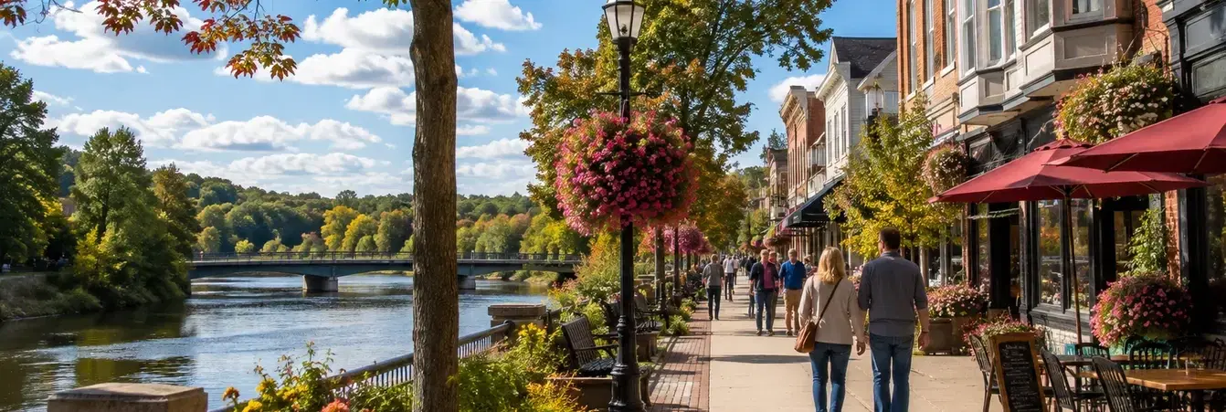 Charming Small Towns Near Mt. Pleasant Michigan Charming small town near Mt. Pleasant Michigan with riverfront walkway, historic downtown shops and tree-lined streets