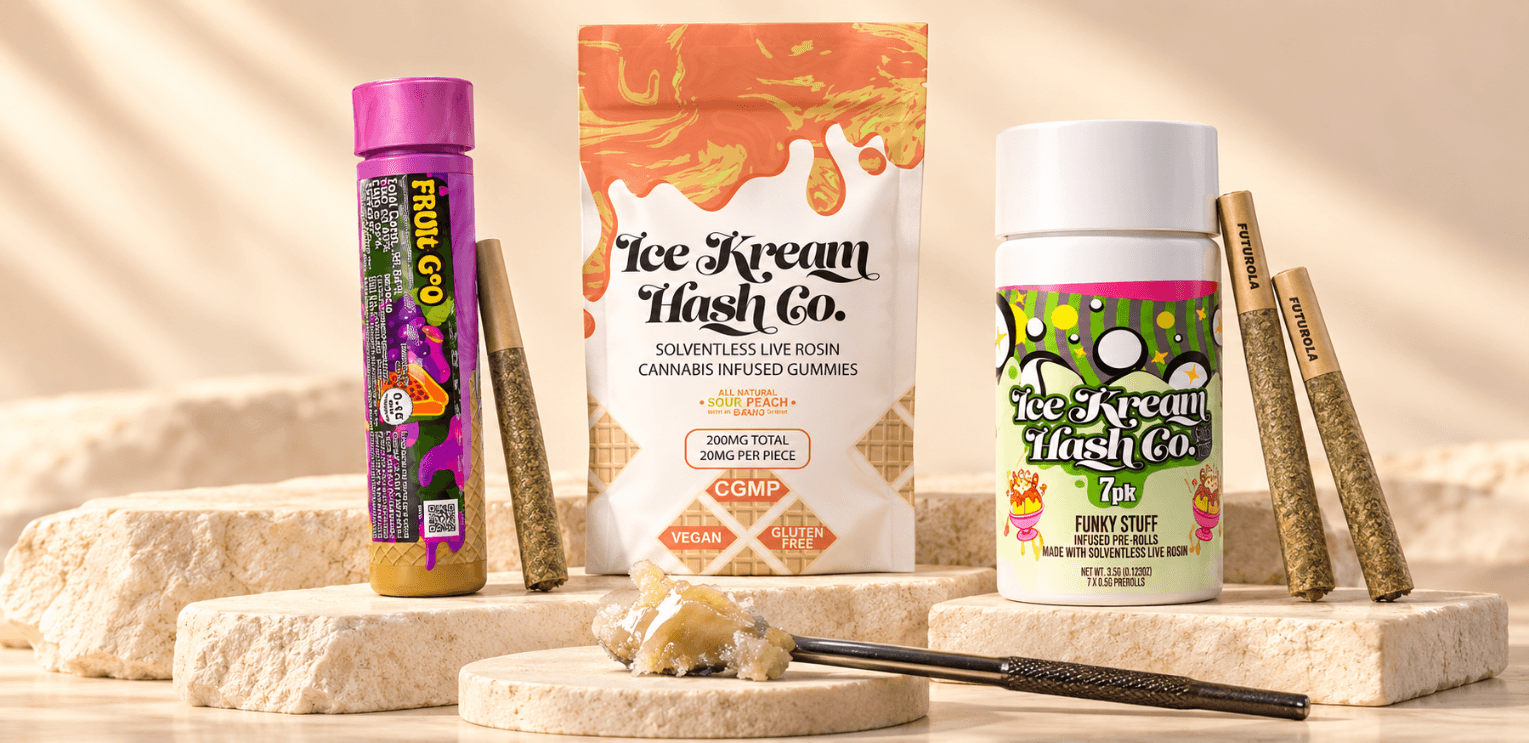 Ice Kream Hash Co. Fruit Goo and Funky Stuff pre-rolls, Sour Peach gummies and live rosin displayed on ivory stone platforms. Ice Kream Hash Co. Fruit Goo and Funky Stuff pre-rolls, Sour Peach gummies and live rosin displayed on ivory stone platforms.
